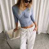 Ryana Top Dusty Blue - worn, behind the scenes