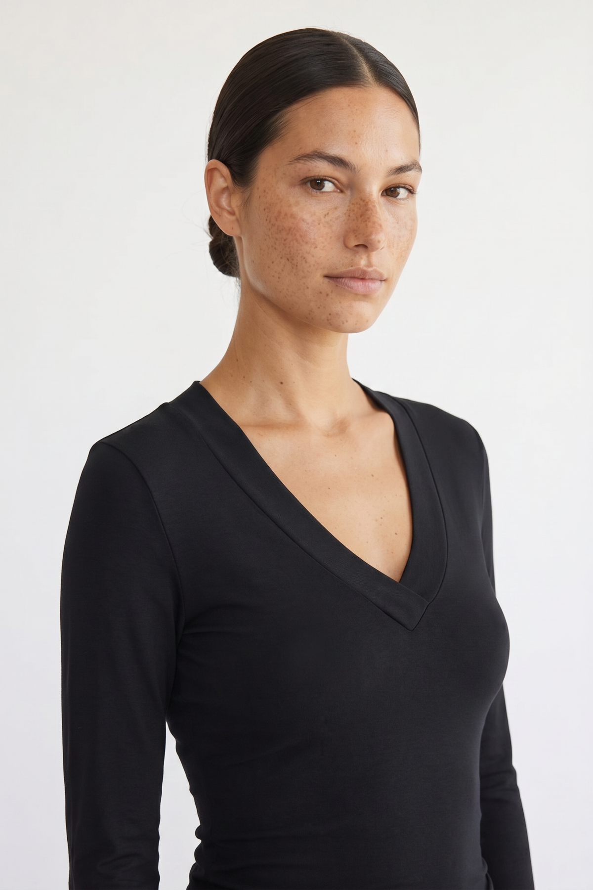 Back view of the Margaux black deep V henley top