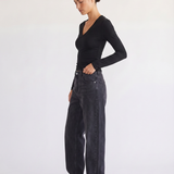 Model styling the Margaux black deep V henley top