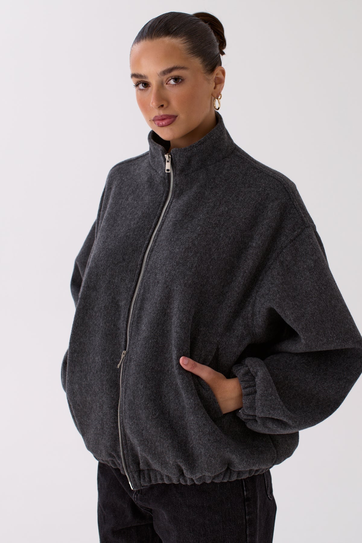 Model wearing the Blake charcoal bomber jacket, full-length