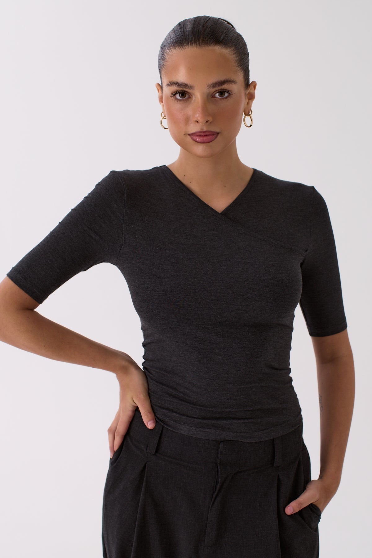 Back view of the Livia grey wrap top